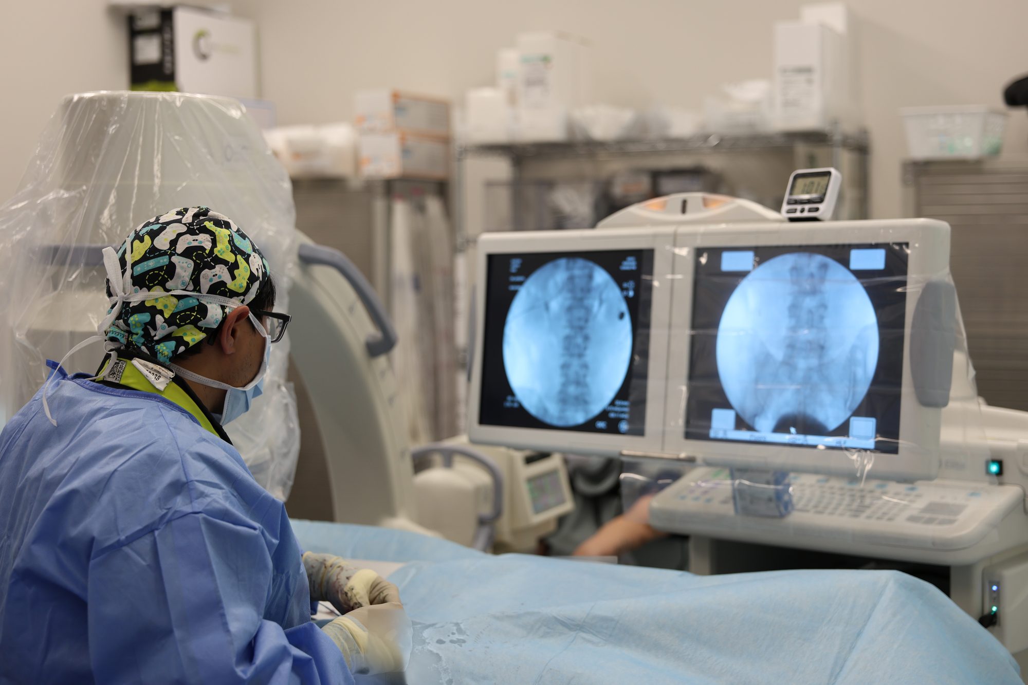 Dr. Arthur Joseph performing a uterine fibroid embolization in the ARV Centers angiography suite