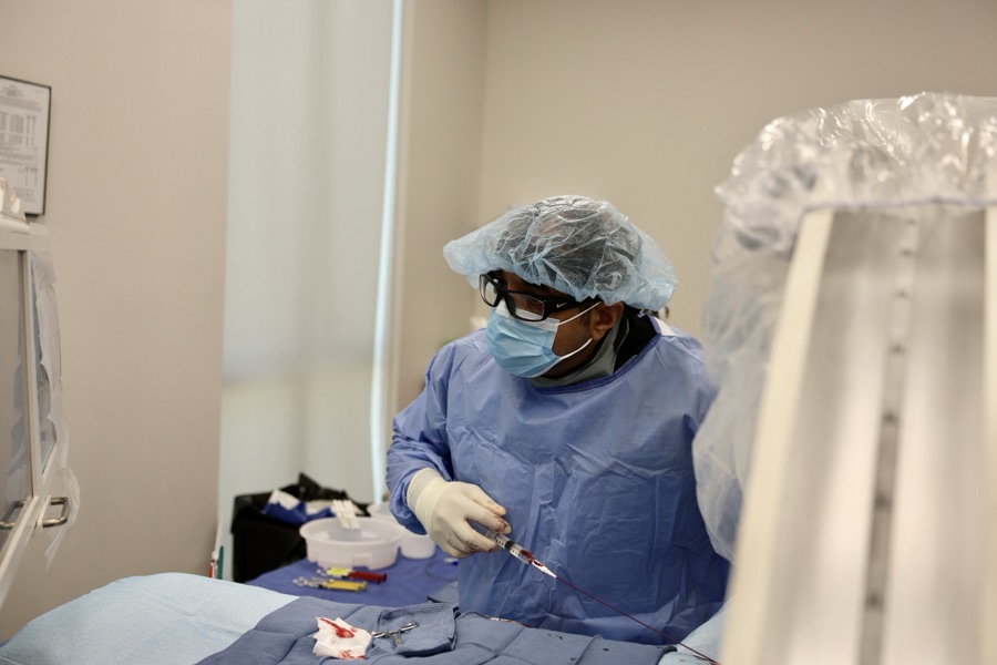 Dr. Samy Al-Bayati performing a plantar fascia embolization
