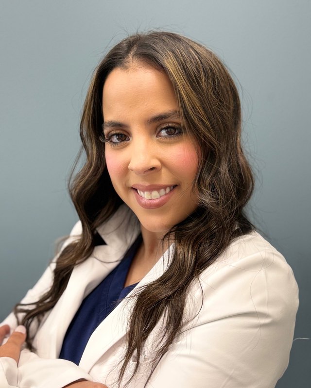 Mariel Salais, MSN, FNP-C, nurse practitioner at Arthritis Relief & Vascular Centers, in a white coat